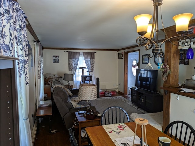 dining space featuring dark wood-type flooring and ornamental molding