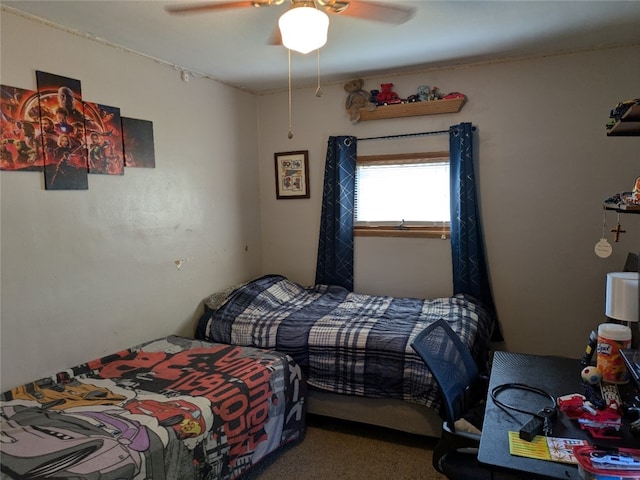 bedroom featuring ceiling fan and carpet floors