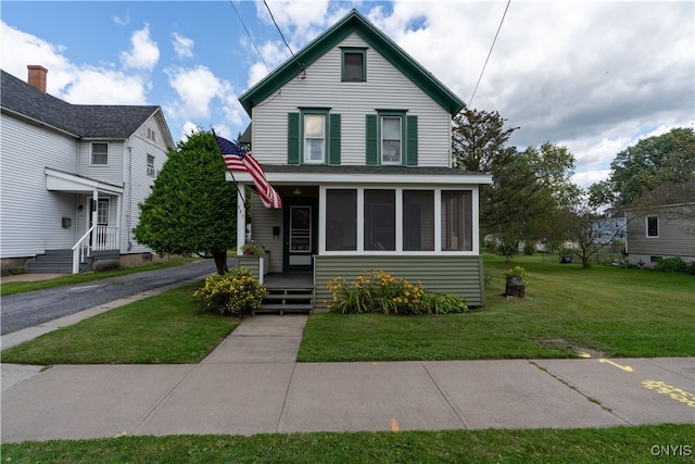 front facade with a front lawn