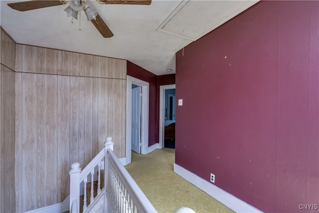 unfurnished bedroom featuring ceiling fan and carpet flooring