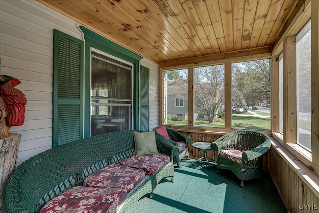 sunroom with wooden ceiling