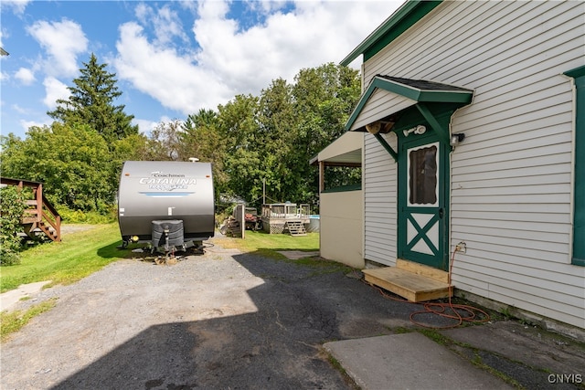 garage featuring a lawn