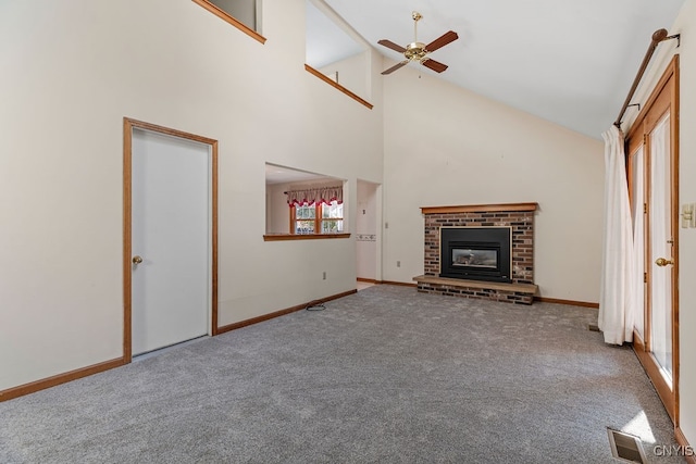 unfurnished living room with light colored carpet, ceiling fan, high vaulted ceiling, and a fireplace