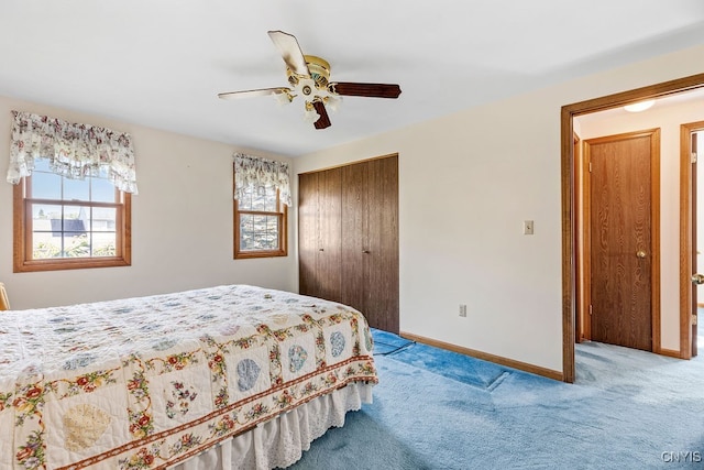 bedroom featuring a closet, ceiling fan, and carpet