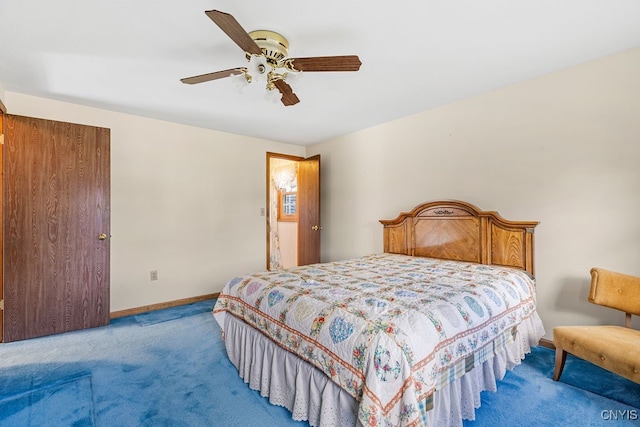 bedroom with ceiling fan and carpet floors