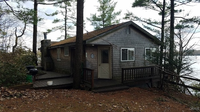 view of front of property featuring a wooden deck