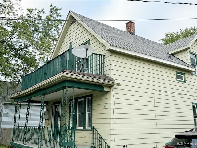 view of home's exterior featuring covered porch