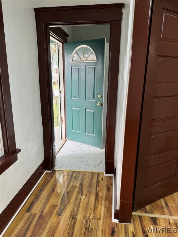 foyer entrance featuring hardwood / wood-style flooring