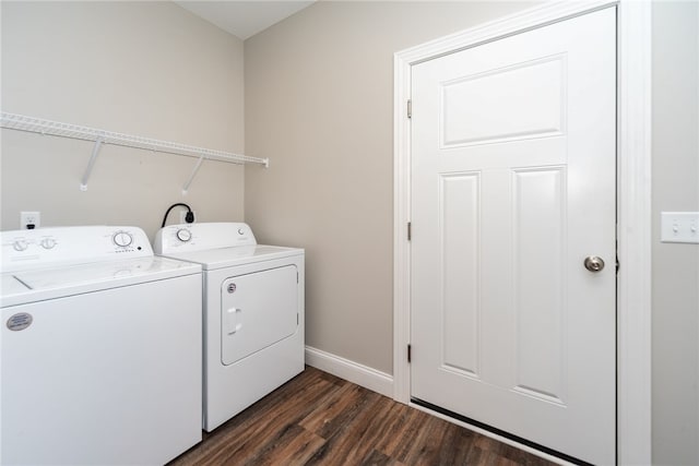 laundry area featuring dark hardwood / wood-style floors and independent washer and dryer