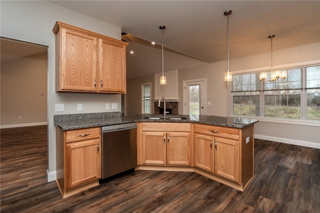 kitchen with dishwasher, an inviting chandelier, sink, and dark wood-type flooring