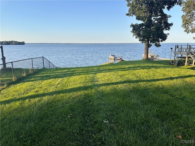 view of water feature with a dock