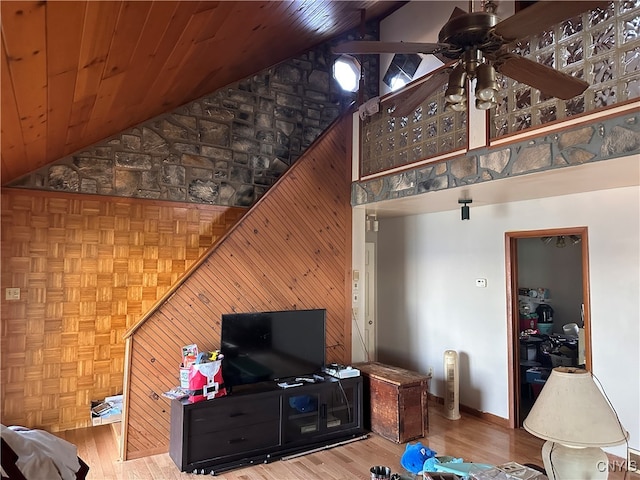 living room featuring wood ceiling, high vaulted ceiling, and ceiling fan