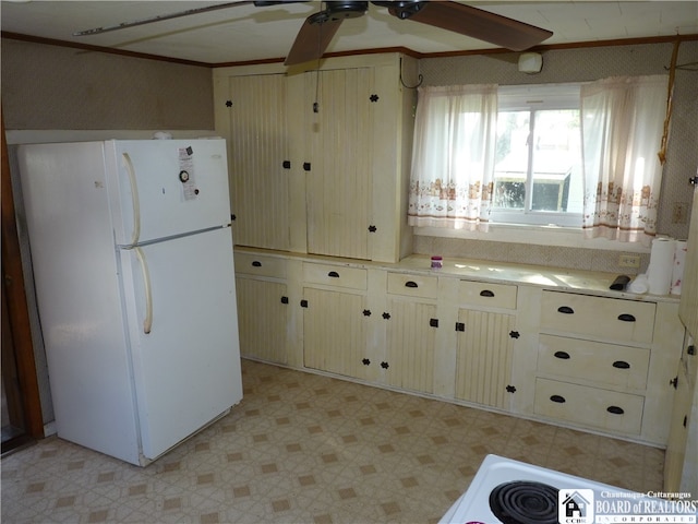 kitchen with white refrigerator and ceiling fan