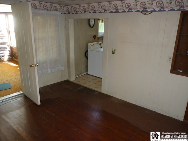 laundry room with washer / dryer and dark hardwood / wood-style flooring