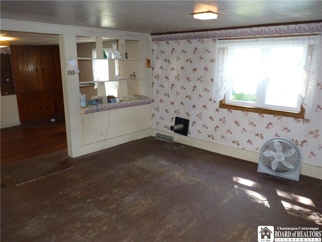 132 Miller St, Sherman, NY 14781 - empty room featuring baseboards, visible vents, dark wood-style floors, and wallpapered walls
