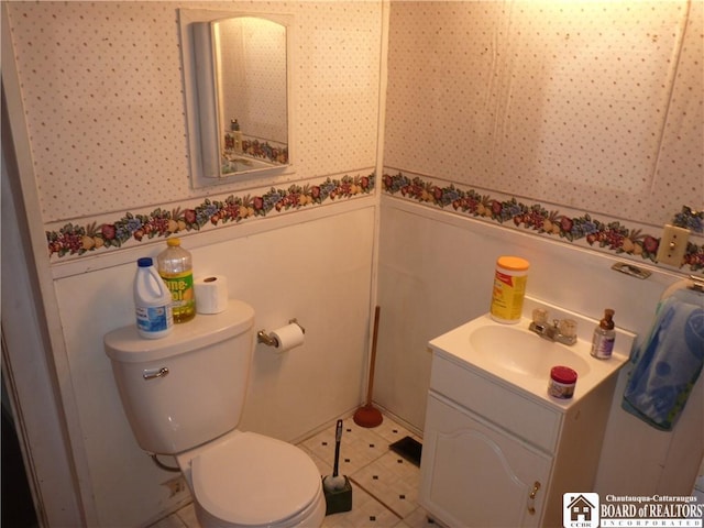 132 Miller St, Sherman, NY 14781 - bathroom with a wainscoted wall, toilet, vanity, and wallpapered walls