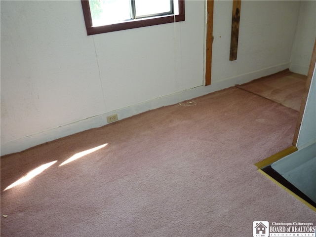 empty room featuring carpet floors