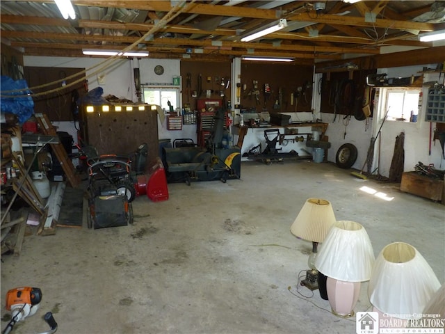 garage with a workshop area