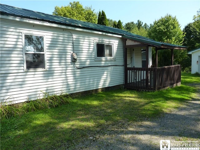 132 Miller St, Sherman, NY 14781 - view of property exterior with metal roof and a yard