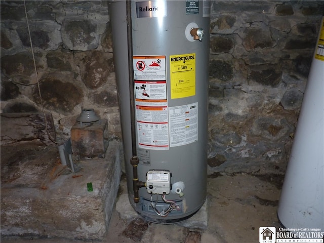 utility room featuring gas water heater