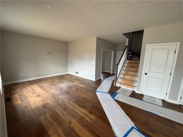 36 Kaye Park Ter, Gates, NY 14624 - stairs featuring wood finished floors and a textured ceiling