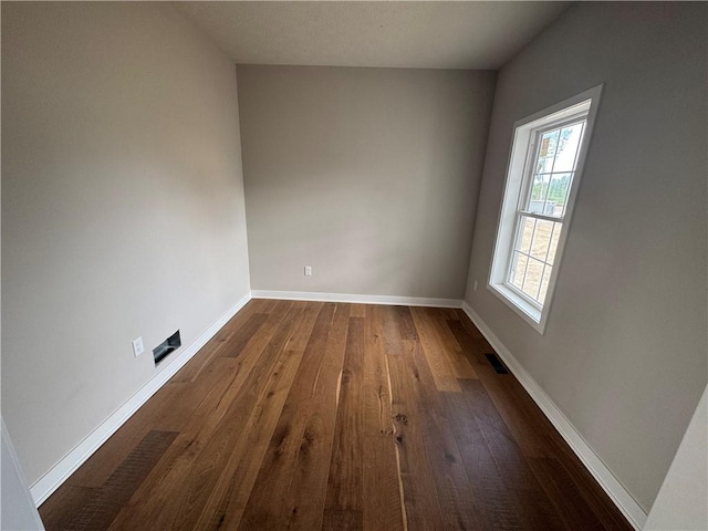 36 Kaye Park Ter, Gates, NY 14624 - empty room featuring wood finished floors and baseboards