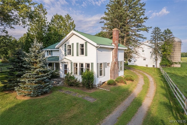 exterior space with a front yard