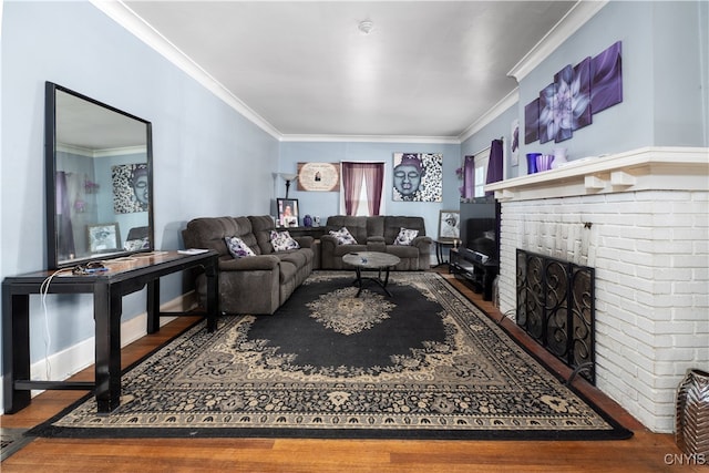 living room with a fireplace, crown molding, and wood-type flooring