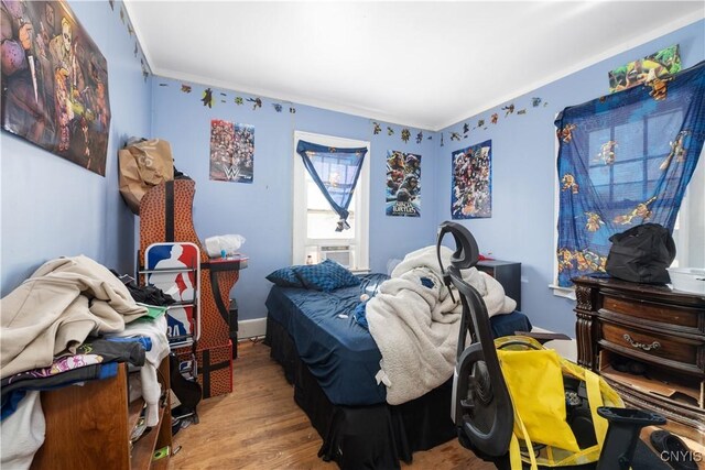 bedroom featuring hardwood / wood-style flooring