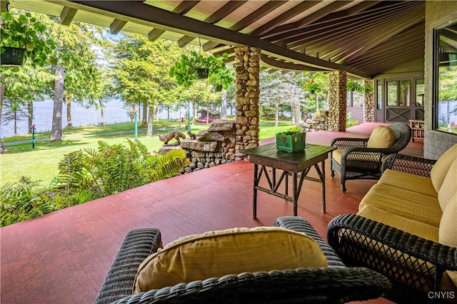 view of patio / terrace featuring an outdoor hangout area and a water view