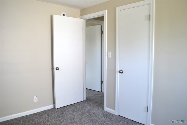 unfurnished bedroom featuring carpet flooring