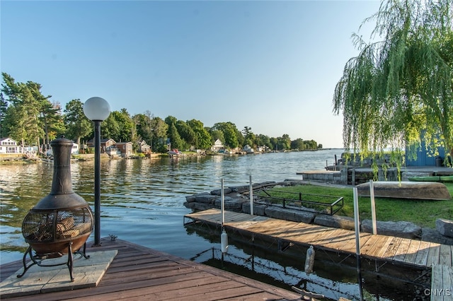 view of dock with a water view