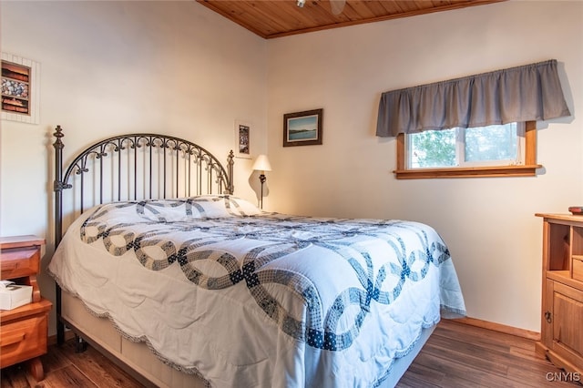 bedroom with wood ceiling and dark hardwood / wood-style flooring