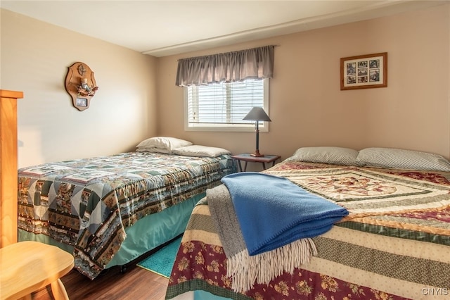 bedroom featuring hardwood / wood-style flooring