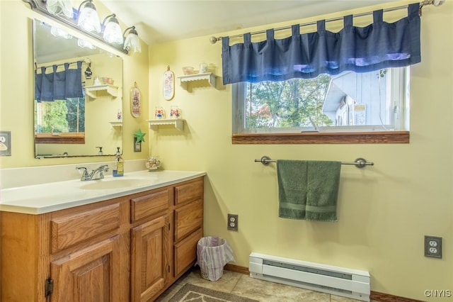 bathroom featuring vanity, a baseboard radiator, and tile patterned flooring