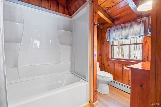 bathroom with toilet, wooden walls, wood-type flooring, a baseboard heating unit, and wood ceiling