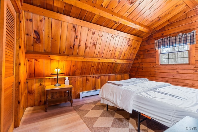 bedroom with lofted ceiling with beams, a baseboard heating unit, wood ceiling, hardwood / wood-style floors, and wood walls