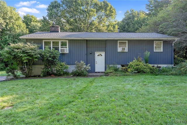 bi-level home featuring a front yard