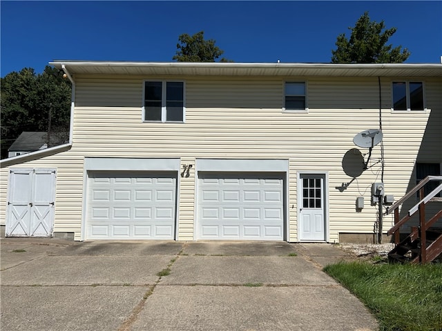 exterior space with a garage