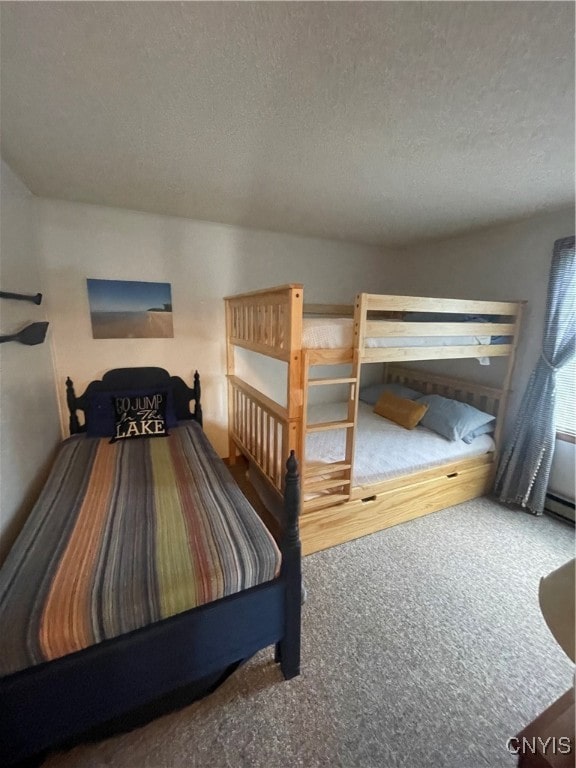 carpeted bedroom with a textured ceiling