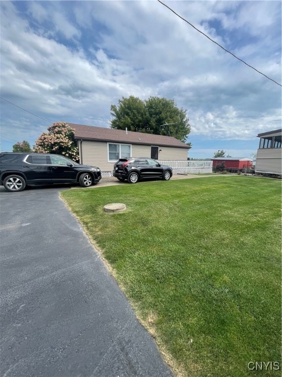 view of front of home featuring a front lawn