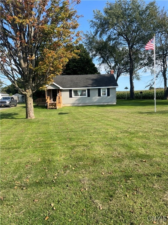 exterior space with a front yard