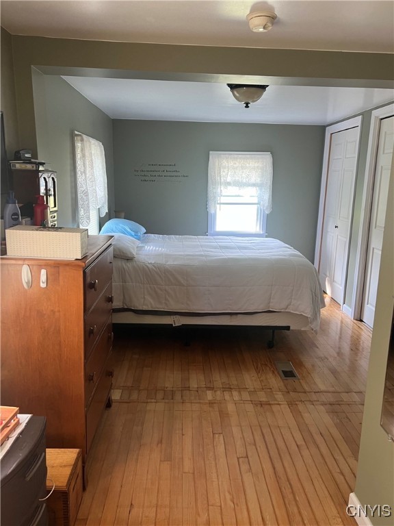 bedroom featuring light wood-type flooring