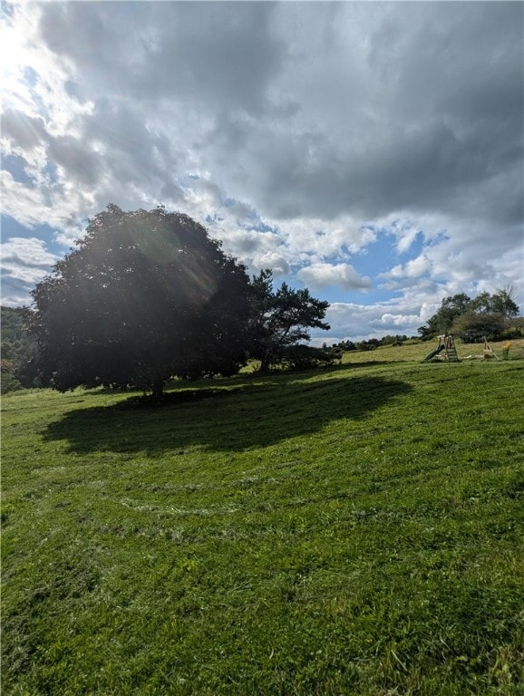 property view of mountains featuring a rural view