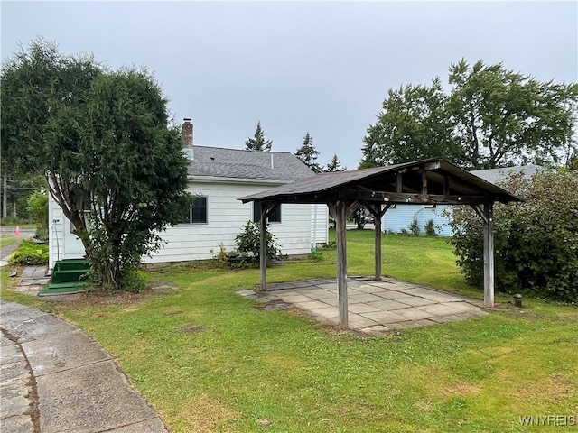 view of yard featuring a gazebo and a patio