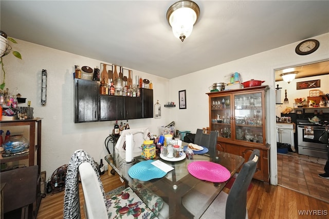 dining space featuring dark hardwood / wood-style floors