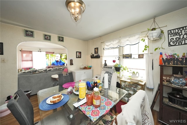 dining room with hardwood / wood-style flooring