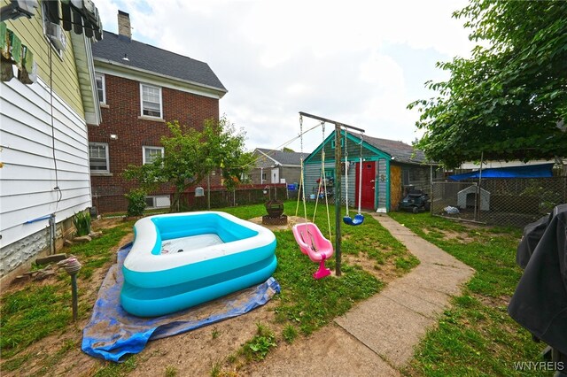 view of yard with a storage shed