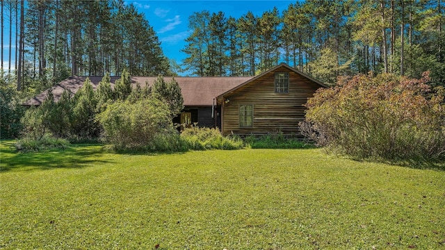 exterior space featuring a lawn