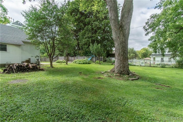 view of yard with fence